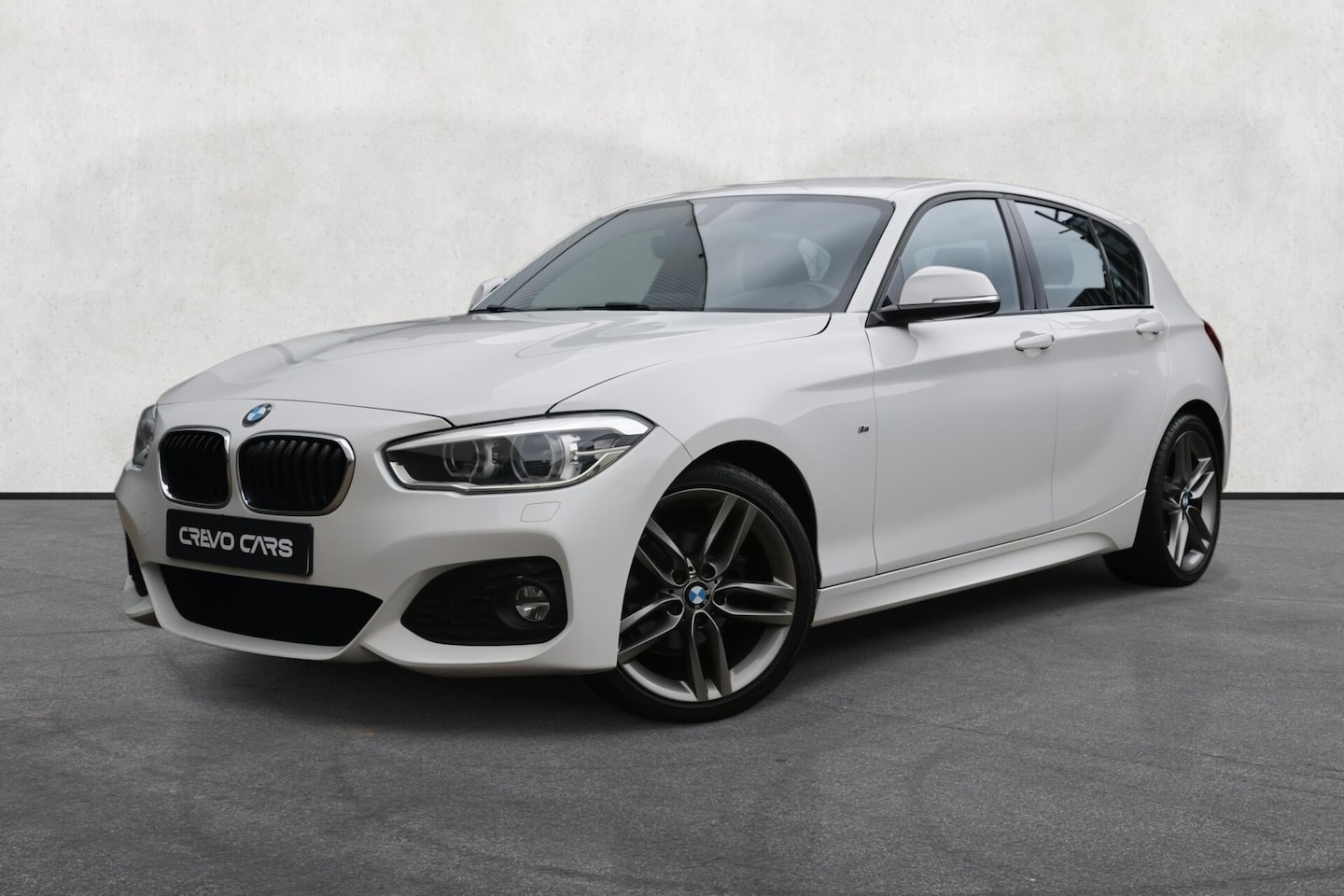 BMW 1-serie - 118i M Sport High Executive | LED | Leder | PDC - AutoWereld.nl