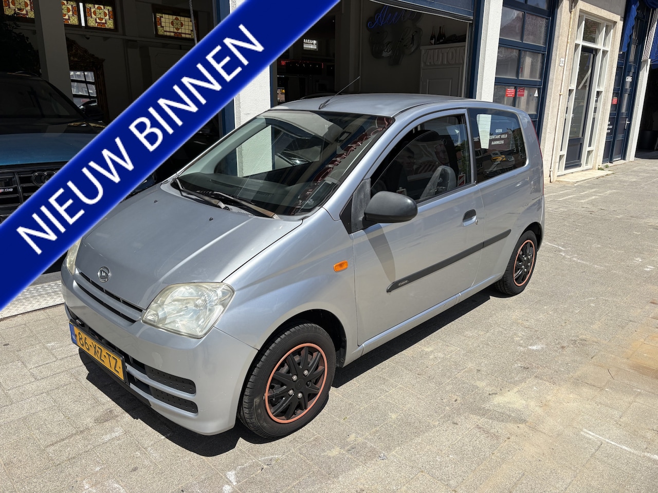 Daihatsu Cuore - 1.0-12V 100th Anniversary AIRCO/NW APK/NAP - AutoWereld.nl
