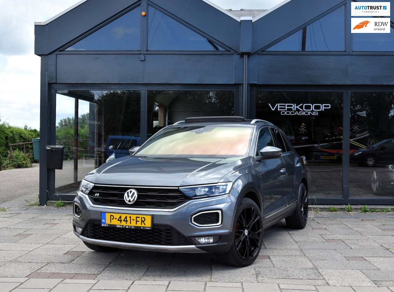 Volkswagen T-Roc - 2.0 TSI 4Motion Sport Business R Carplay PANO Automaat - AutoWereld.nl