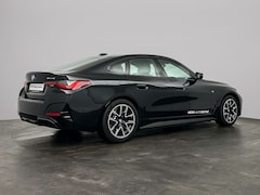 BMW i4 - eDrive40 M Sport Edition 84 kWh | Trekhaak | Comfort Access | Schuifdak | Camera | Hi-Fi |
