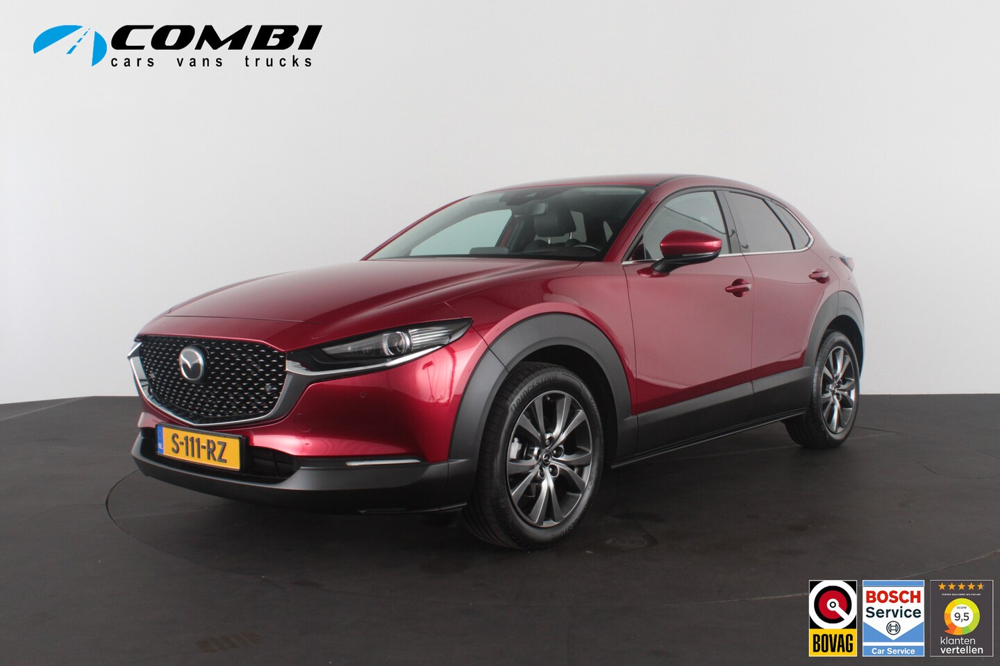 Mazda CX-30 - 2.0 e-SkyActiv-X M Hybrid Luxury > 186pk/Trekhaak/Crystal Red Soul/Bose/Leer/Memory... - AutoWereld.nl