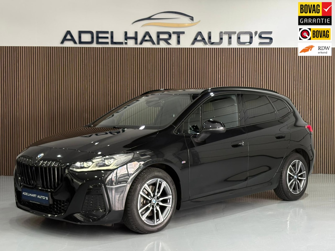 BMW 2-serie Active Tourer - 218i M Sport Automaat / Navigatie full map Wide screen / Camera / Adaptive Cruise / Climat - AutoWereld.nl