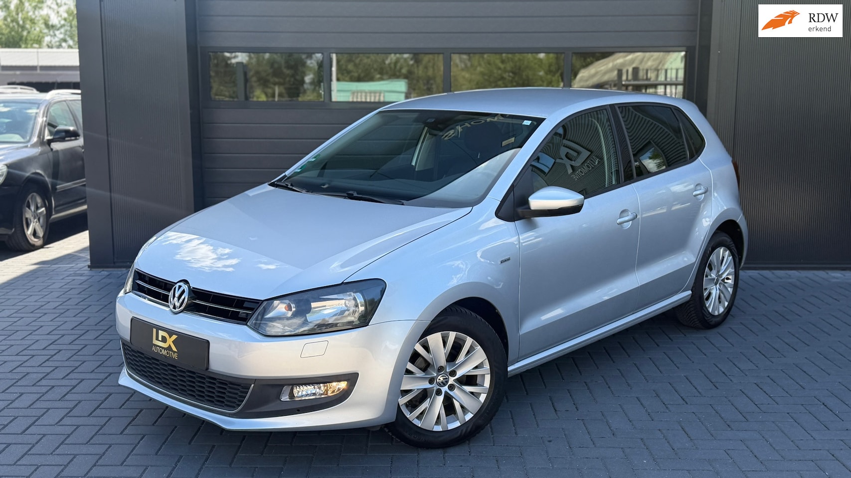 Volkswagen Polo - 1.2-12V BlueMotion Comfortline Airco|Stoelverwarming|PDC Achter - AutoWereld.nl