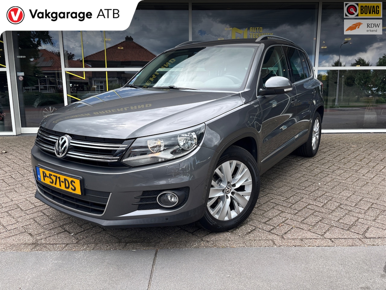 Volkswagen Tiguan - 1.4 TSI Sport&Style - AutoWereld.nl