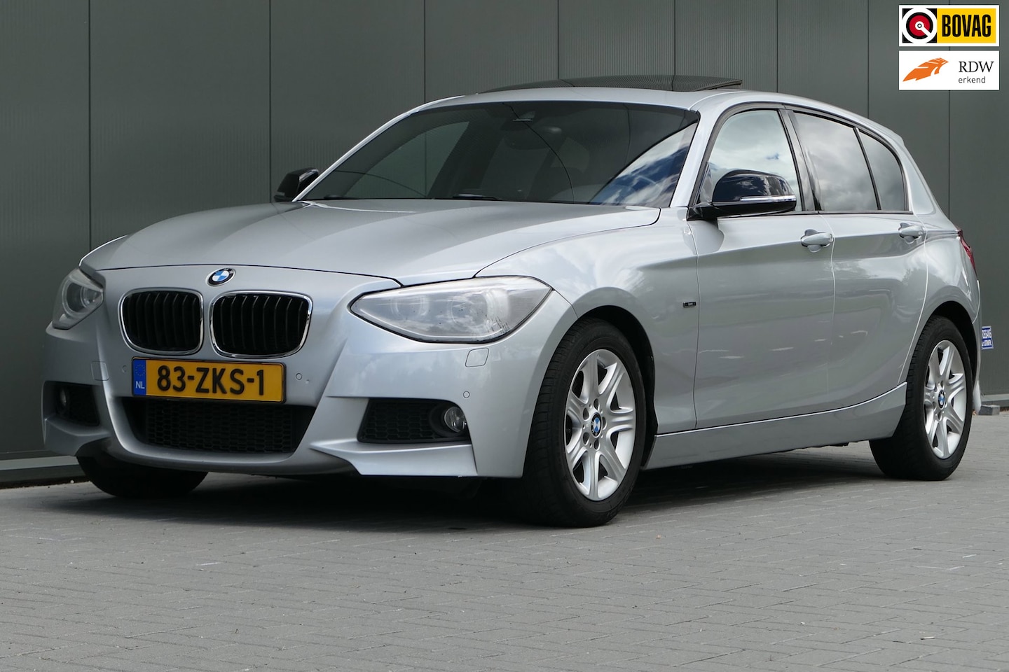 BMW 1-serie - 118i Business Sport Schuifdak Sportstoelen Navi Clima - AutoWereld.nl