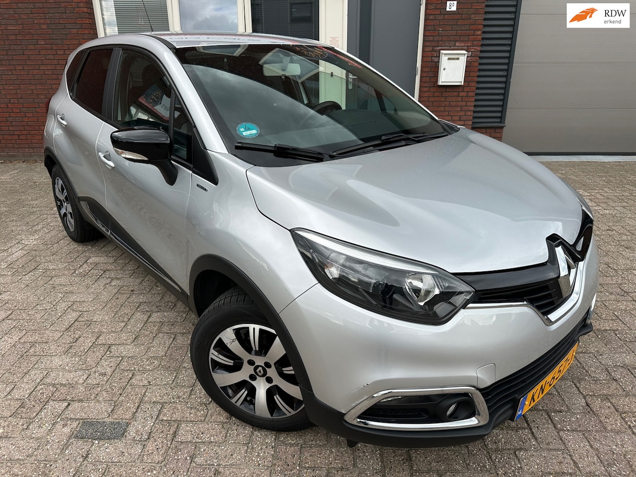 Renault Captur - 0.9 TCe Limited / Navi / PDC / DAB / Airco / Cruise / NAP - AutoWereld.nl