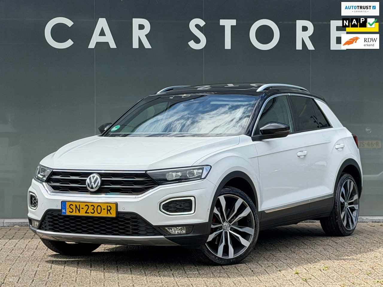 Volkswagen T-Roc - 2.0 TSI 4Motion Sport Pano / Beats / Camera/Virtual/ - AutoWereld.nl