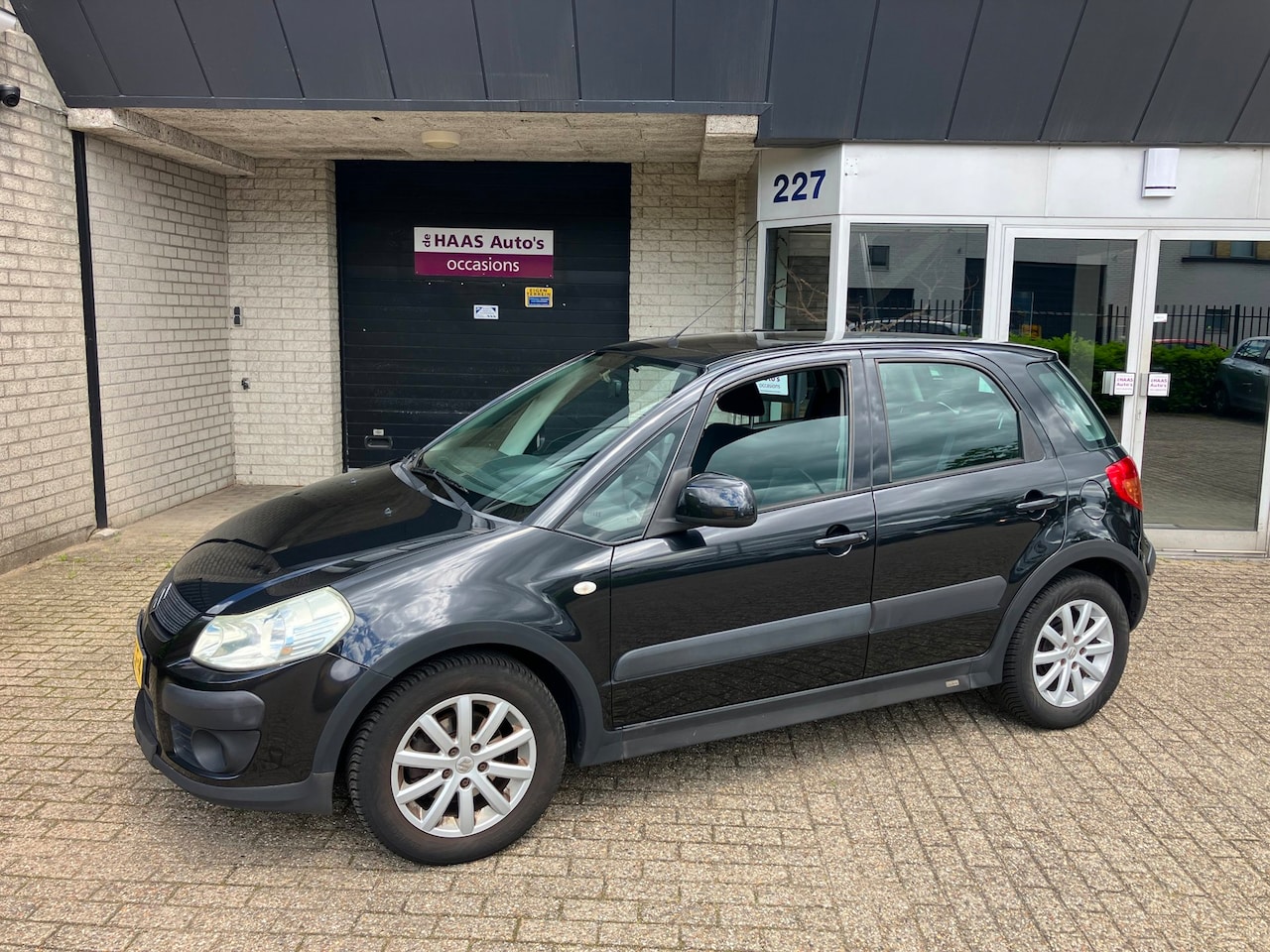 Suzuki SX4 - 1.6 Comfort / DEALER SERVICED / HOGE INSTAP / AIRCO / APK 2027 / CAMERA / ALU VELGEN - AutoWereld.nl