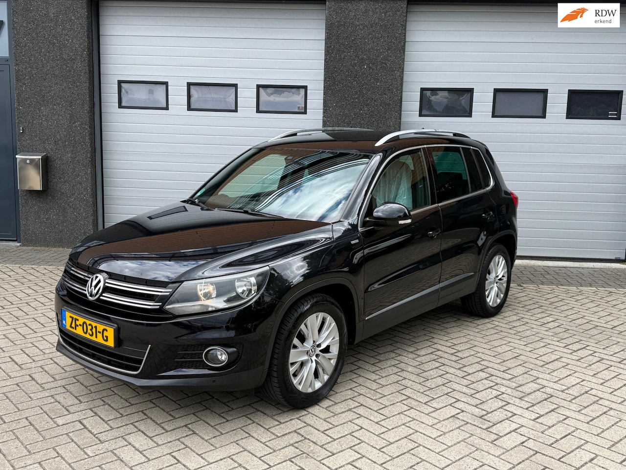 Volkswagen Tiguan - 1.4 TSI Sport&Style LIFE/TREKHAAK/CLIMA/STOELVERWARMING/AIRCO - AutoWereld.nl