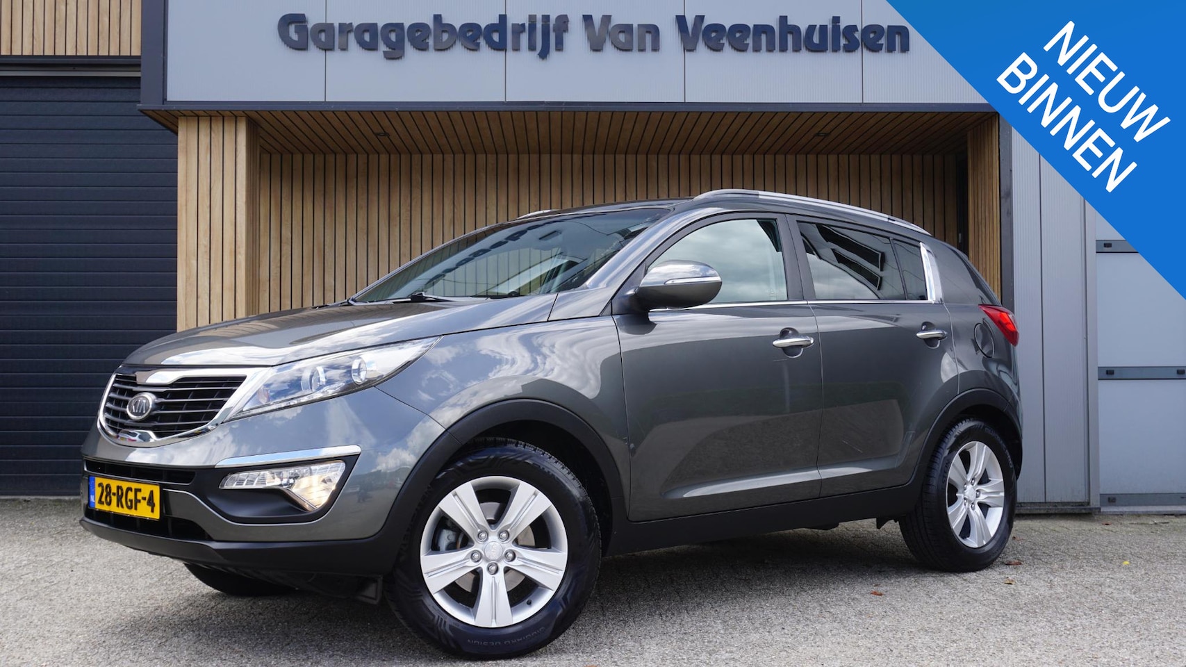 Kia Sportage - 1.6 GDI 135pk X-ecutive Plus Pack H-Leder Clima Cruise Control 17inch LM Trekhaak *NL auto - AutoWereld.nl