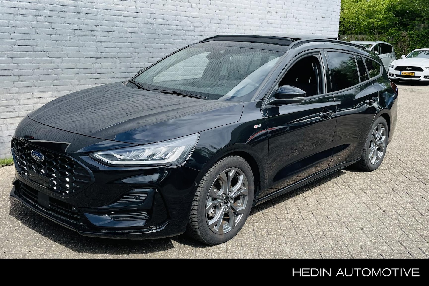 Ford Focus Wagon - 1.0 EcoBoost Hybrid ST Line X Panoramadak | Trekhaak | Adaptive Cruise | All weather bande - AutoWereld.nl