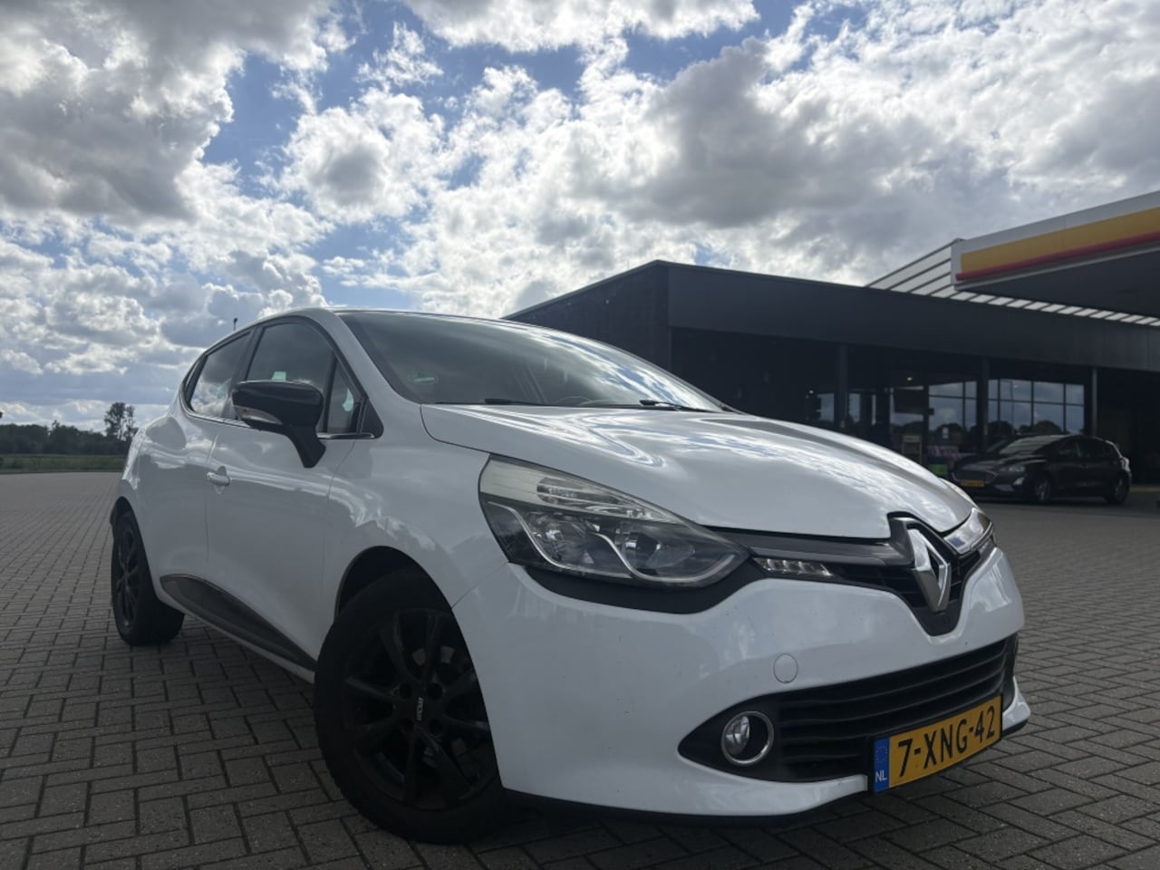 Renault Clio - 1.5 dCi Night&Day Sensor|Navi|Clima|Cruise - AutoWereld.nl