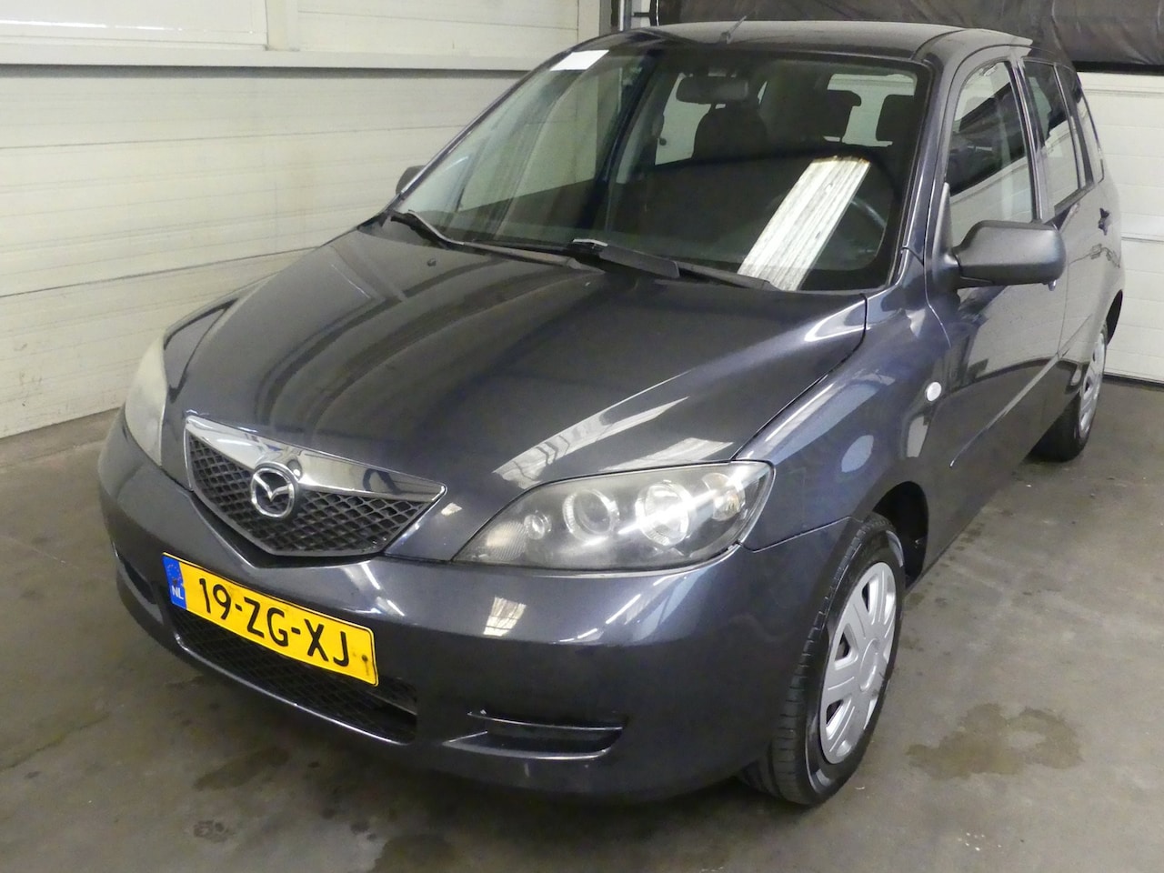 Mazda 2 - 1.4 Exclusive - Trekhaak - Airco - AutoWereld.nl