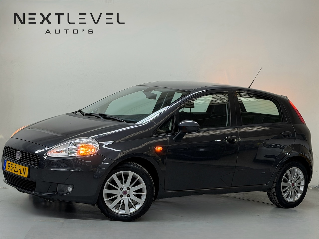Fiat Grande Punto - 1.4-16V Emotion 6Bak Cruise N.DIST RIEM 1 JAAR APK - AutoWereld.nl