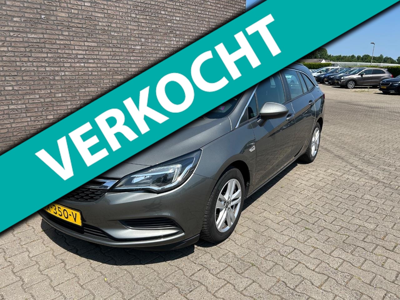 Opel Astra Sports Tourer - 1.6 CDTI Business+ EXPORT - AutoWereld.nl
