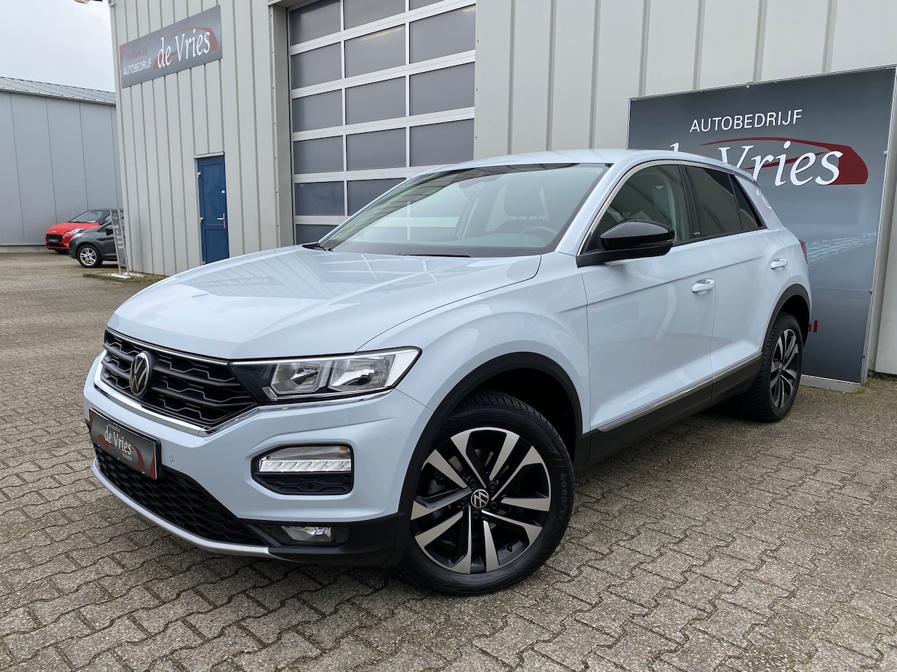 Volkswagen T-Roc - 1.5 TSI Style / Clima / Cruise / Navi / PDC V&A / LMV / Privacy Glass - AutoWereld.nl