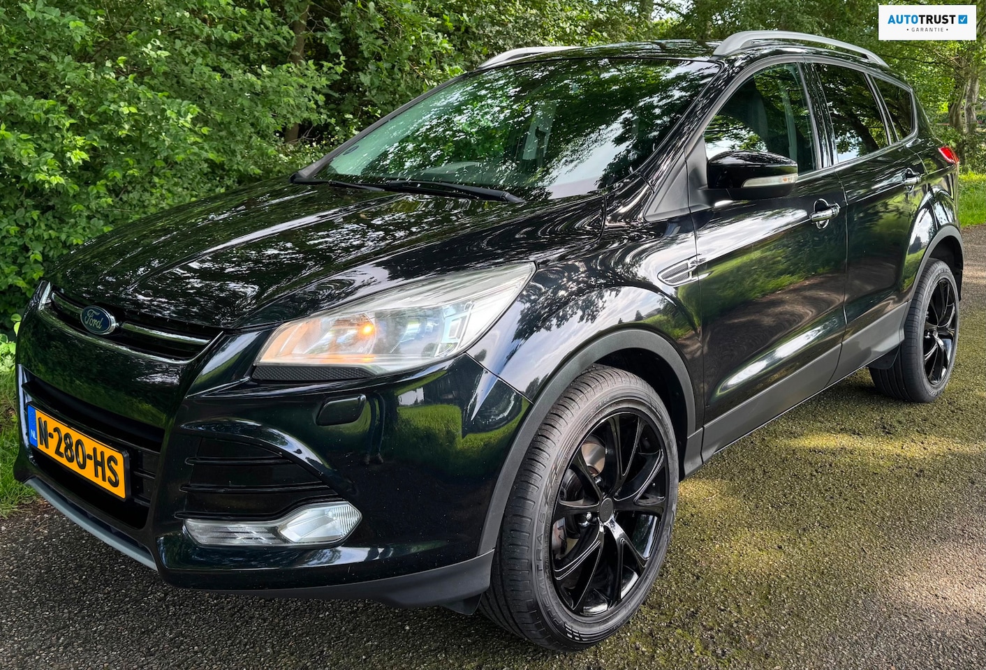 Ford Kuga - 1.6 Titanium 2013 150PK TREKHAAK NAVI CAMERA CRUISE - AutoWereld.nl