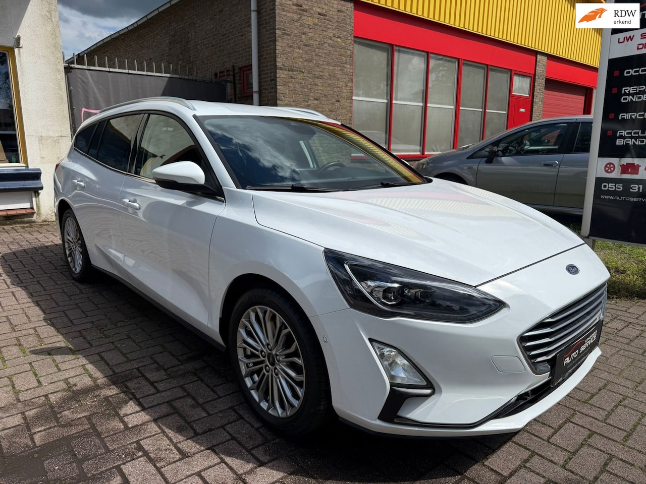 Ford Focus Wagon - 1.0 EcoBoost Titanium X Business 1e EIGENAAR|Camera|Cruise|Vol..! - AutoWereld.nl