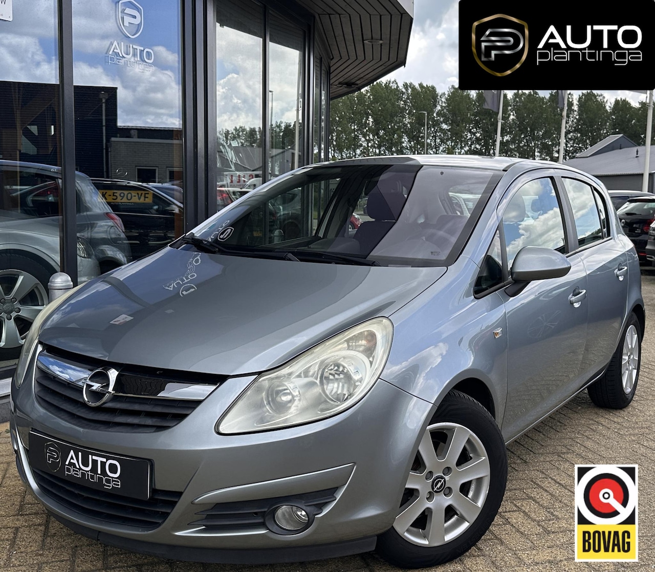 Opel Corsa - 1.4-16V Cosmo 101PK | NL AUTO | Airco | Cruise Control | Lichtmetalen Velgen | 5 Deurs | 2 - AutoWereld.nl