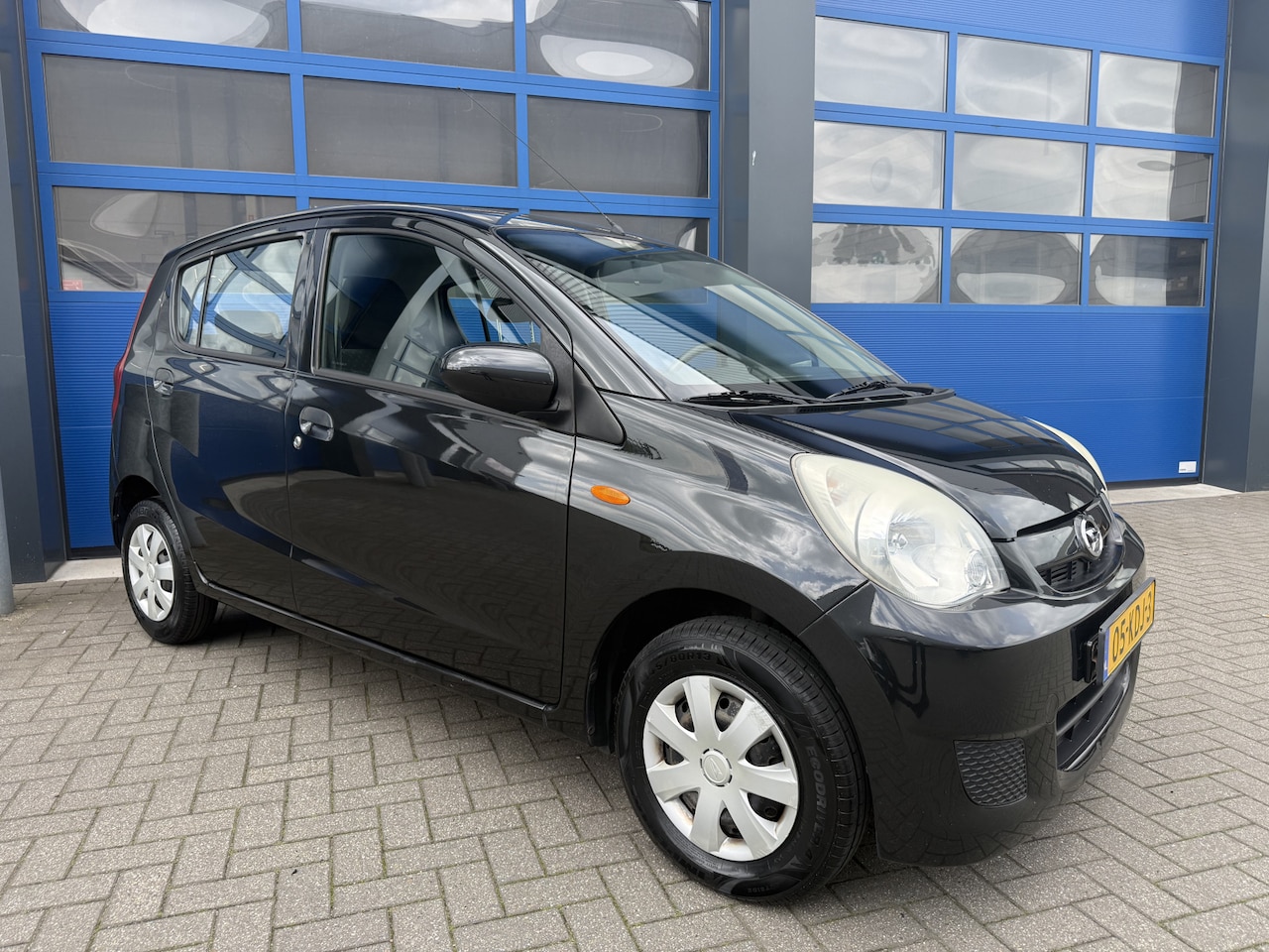 Daihatsu Cuore - 1.0 69pK Airco/ BT Radio/ Comfort - AutoWereld.nl