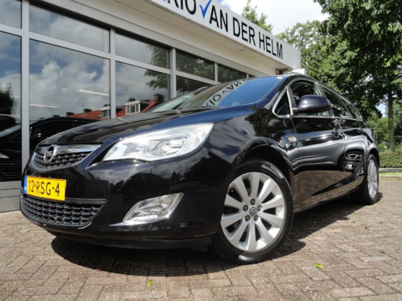 Opel Astra Sports Tourer - 1.4 Cosmo airco - AutoWereld.nl