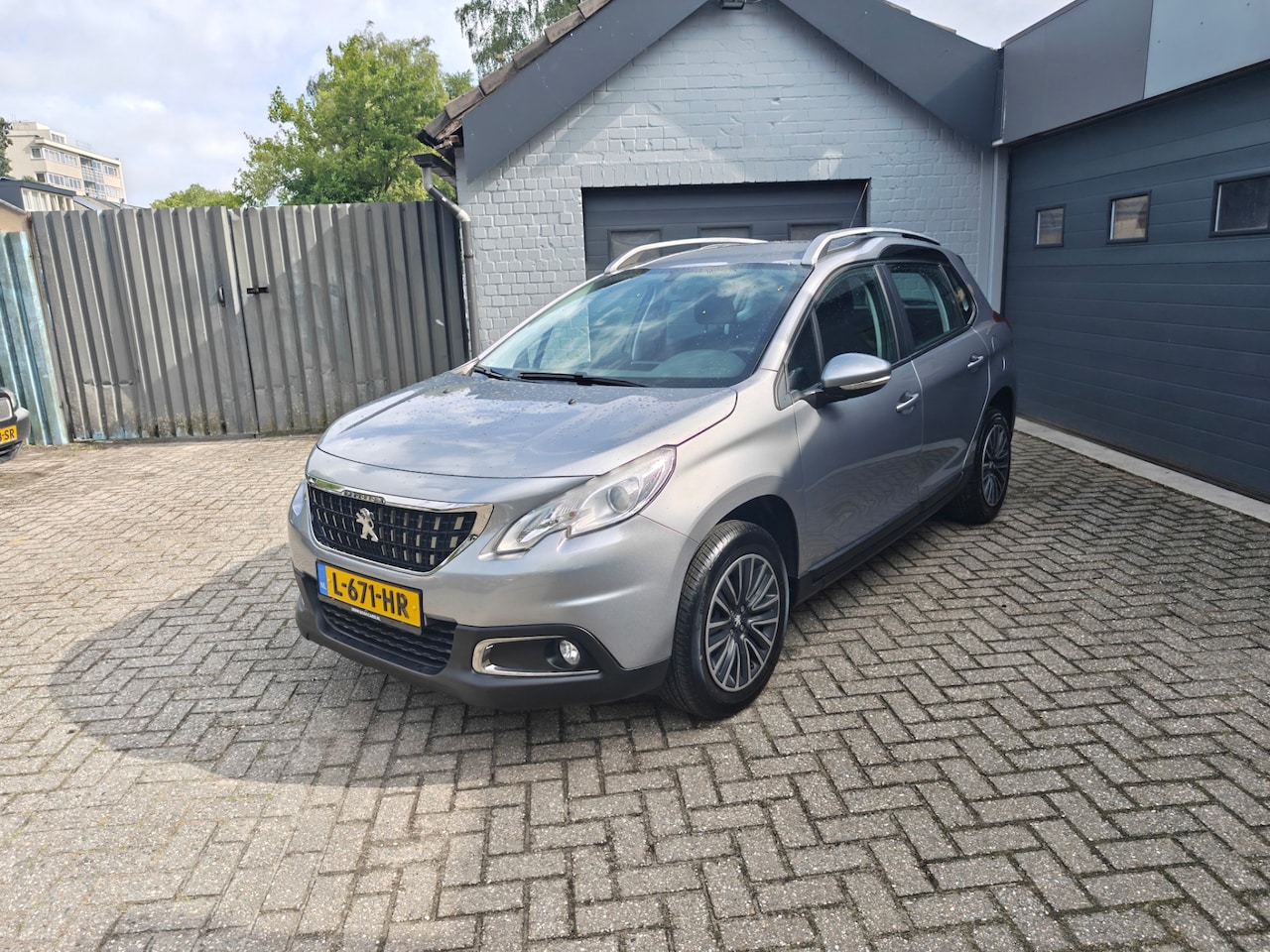 Peugeot 2008 - 1.2 PureTech Blue Lease Executive 1.2 PureTech Blue Lease Executive,Airco,Navi,Cruise control,Parkeer sensoren achter - AutoWereld.nl