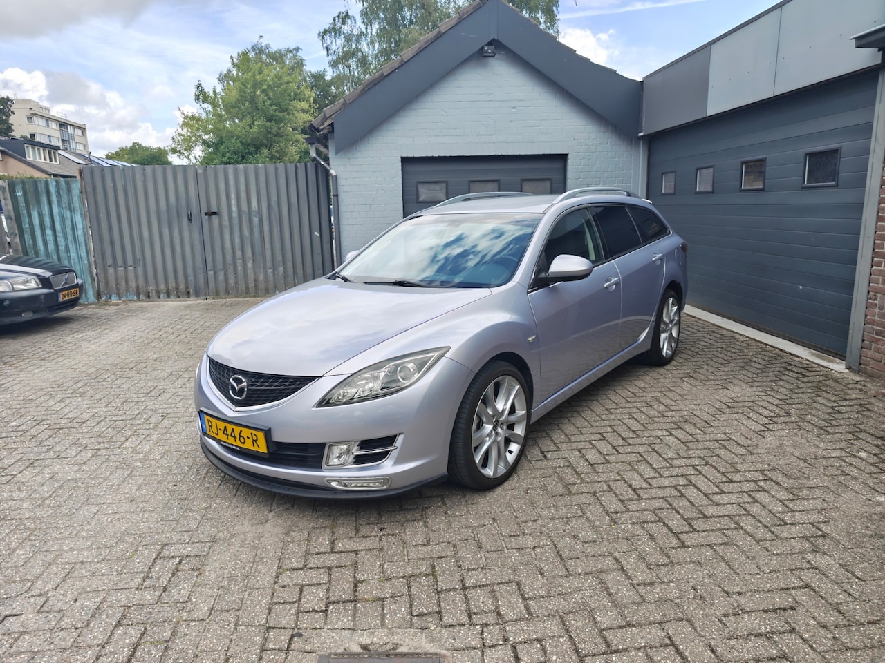 Mazda 6 Sportbreak - 2.0 S-VT TS 2.0 S-VT TS,Navi,Cruise control,Automaat,Afneembare trekhaak,Licht metalen velgen - AutoWereld.nl