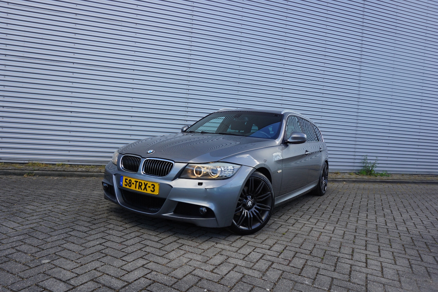 BMW 3-serie Touring - 318i Corporate Lease Luxury Line Airco / Navi / Cruise / Elektr. ramen / Parkeers. / Trekh - AutoWereld.nl