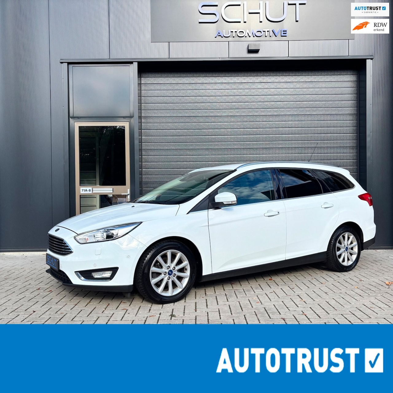 Ford Focus Wagon - 125pk Titanium XENON | CLIMA | CRUISEN CONTROL | TREKHAAK | NAVI | STOELVERWARMING | PARKA - AutoWereld.nl
