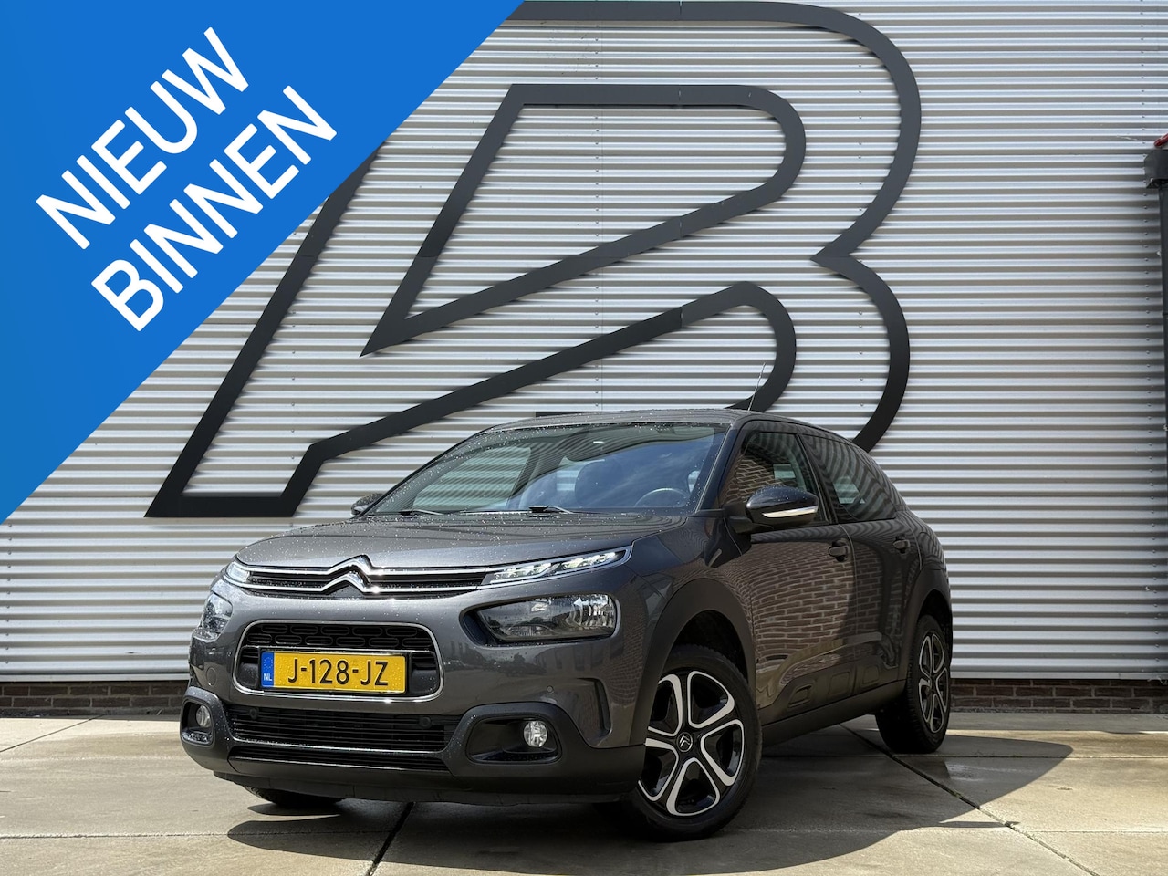 Citroën C4 Cactus - 1.2 PureTech Business 2e Eigenaar|Carplay|PDC V+A|D-riem vv in 2024|Clima|Cruise|Navi|N.A. - AutoWereld.nl