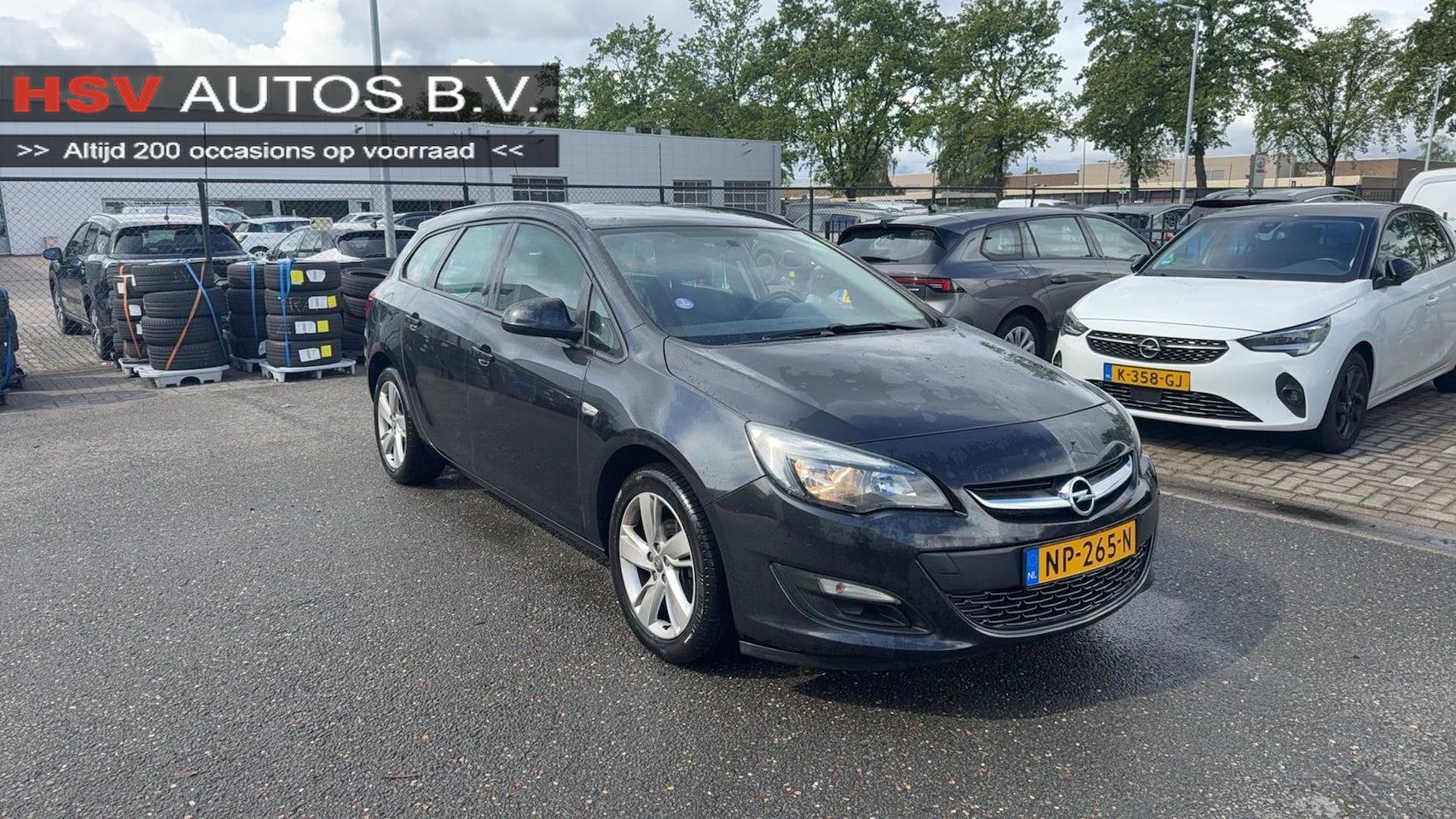 Opel Astra Sports Tourer - 1.4 Turbo Business + airco LM *123.000km* - AutoWereld.nl