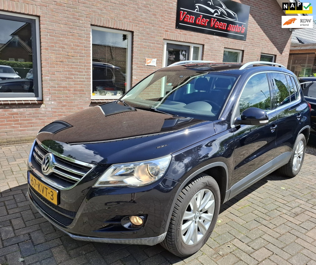 Volkswagen Tiguan - 1.4 TSI Sport&Style 4Motion. Distributieketting(set) vervangen. 2de eigenaar. O.a. airco, - AutoWereld.nl
