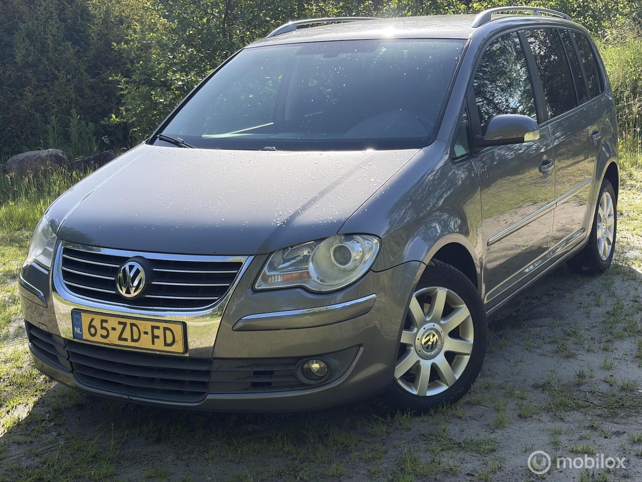 Volkswagen Touran - 1.4 TSI Highline 7p. 1.4 TSI Highline--7-persoons - AutoWereld.nl