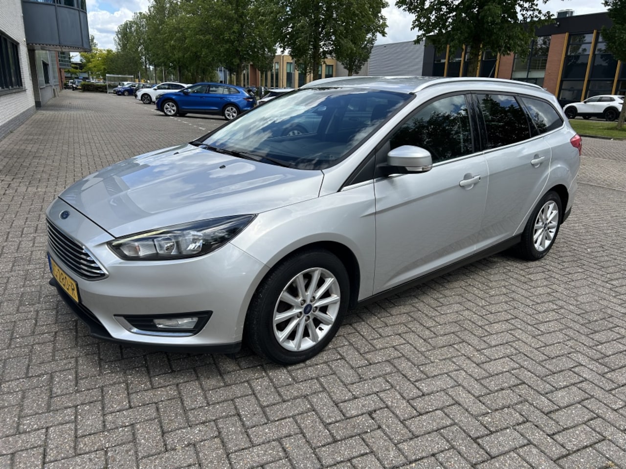 Ford Focus Wagon - 1.0 Titanium 125PK NAVI CRUISE CLIMA. - AutoWereld.nl
