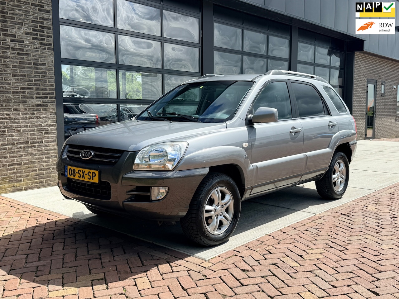 Kia Sportage - 2.0 CVVT Executive 2.0 CVVT Executive - AutoWereld.nl