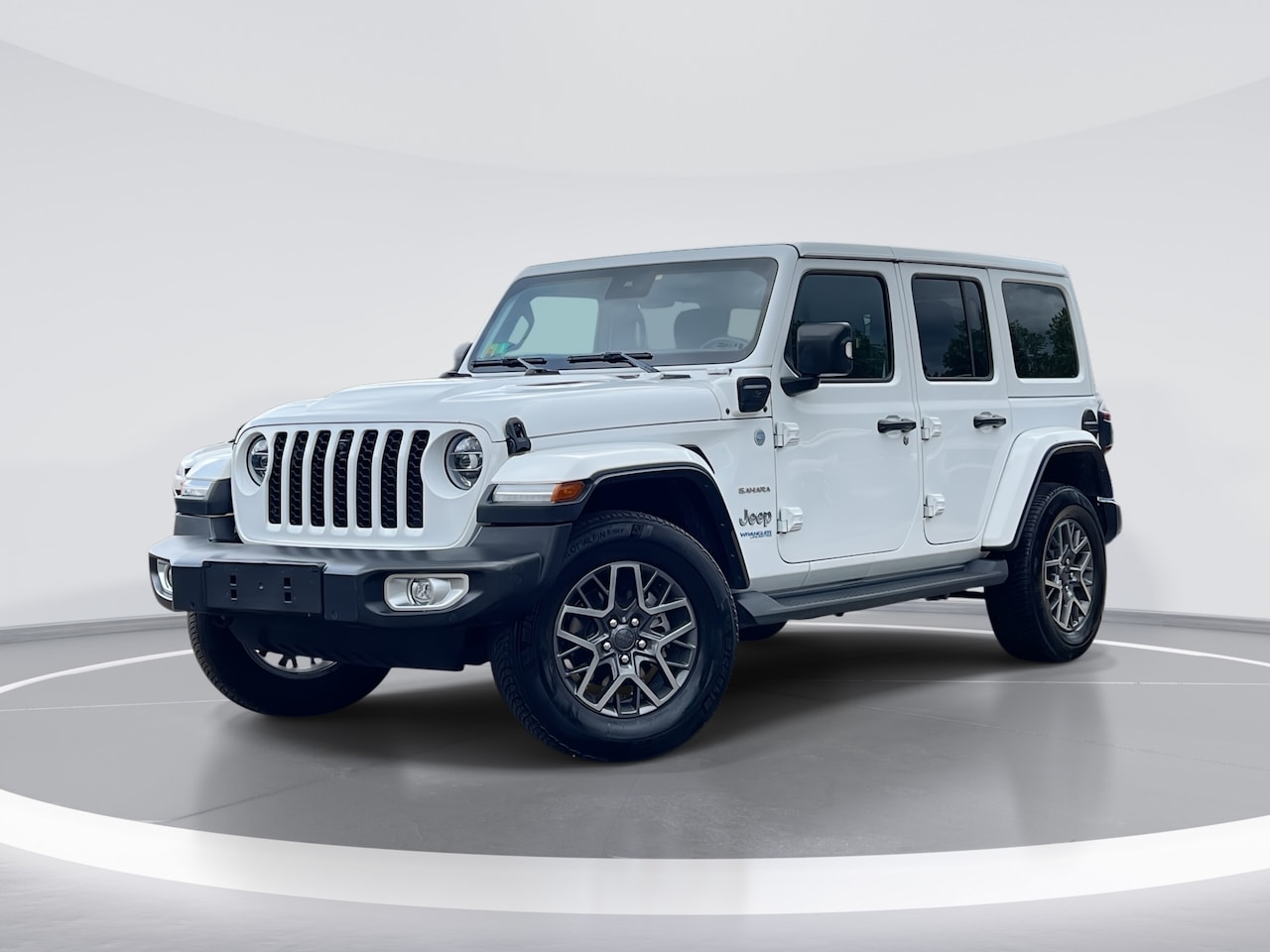 Jeep Wrangler Unlimited - 4xe 380 Sahara |CARPLAY|STUUR+STOELVW|NAVI|CRUISE| 5220 - AutoWereld.nl