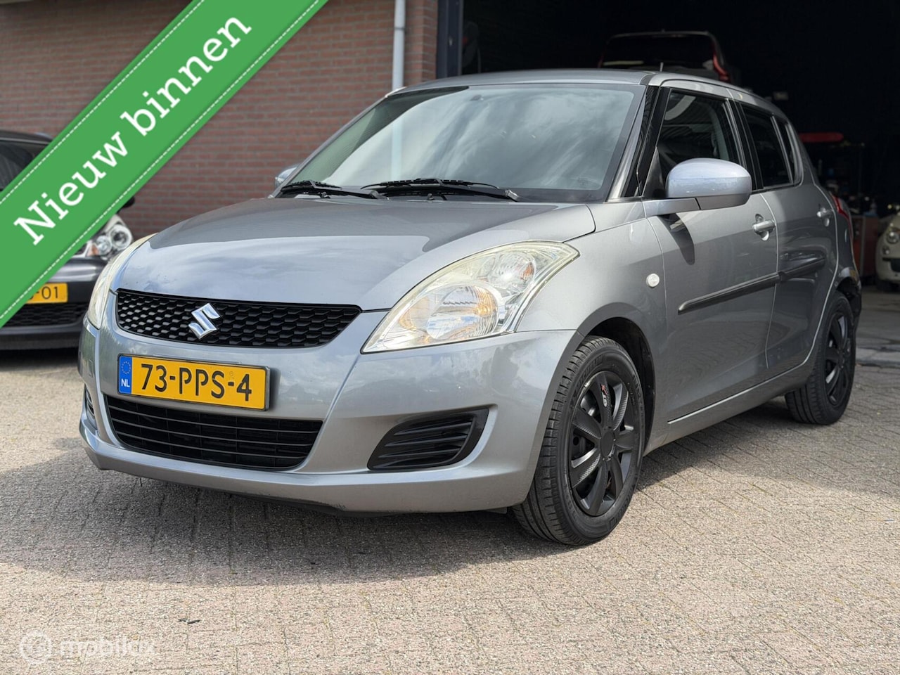 Suzuki Swift - 1.2 Comfort 5DRS|AIRCO|STOELVERWARMING|APK! - AutoWereld.nl
