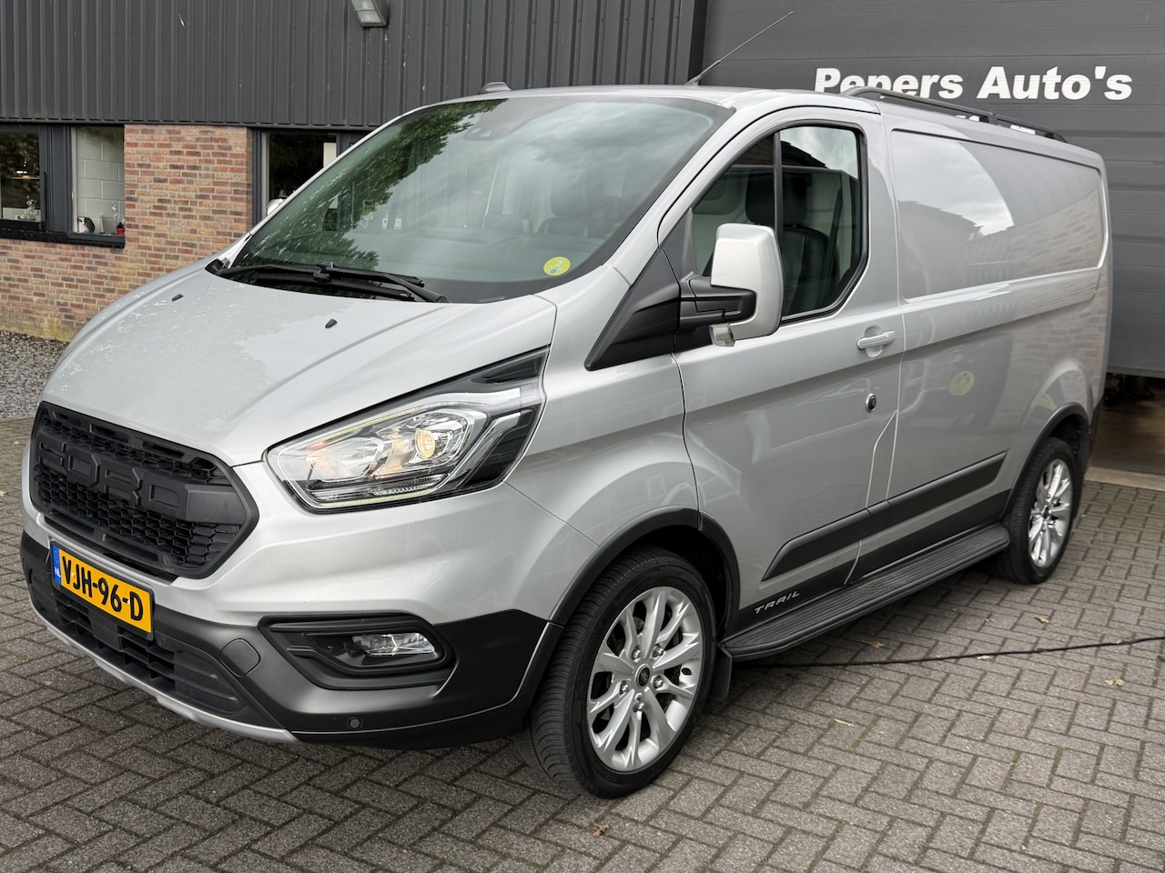 Ford Transit Custom - 300 2.0 TDCI L1H1 Trail Navi. Leer. Sportvelgen. cruise contr . Trekhaak . 130 PK - AutoWereld.nl