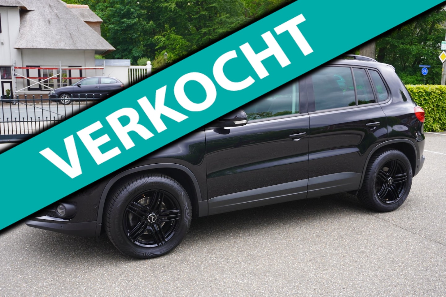 Volkswagen Tiguan - 1.4 TSI Sport&Style Airco Pdc Trekhaak - AutoWereld.nl