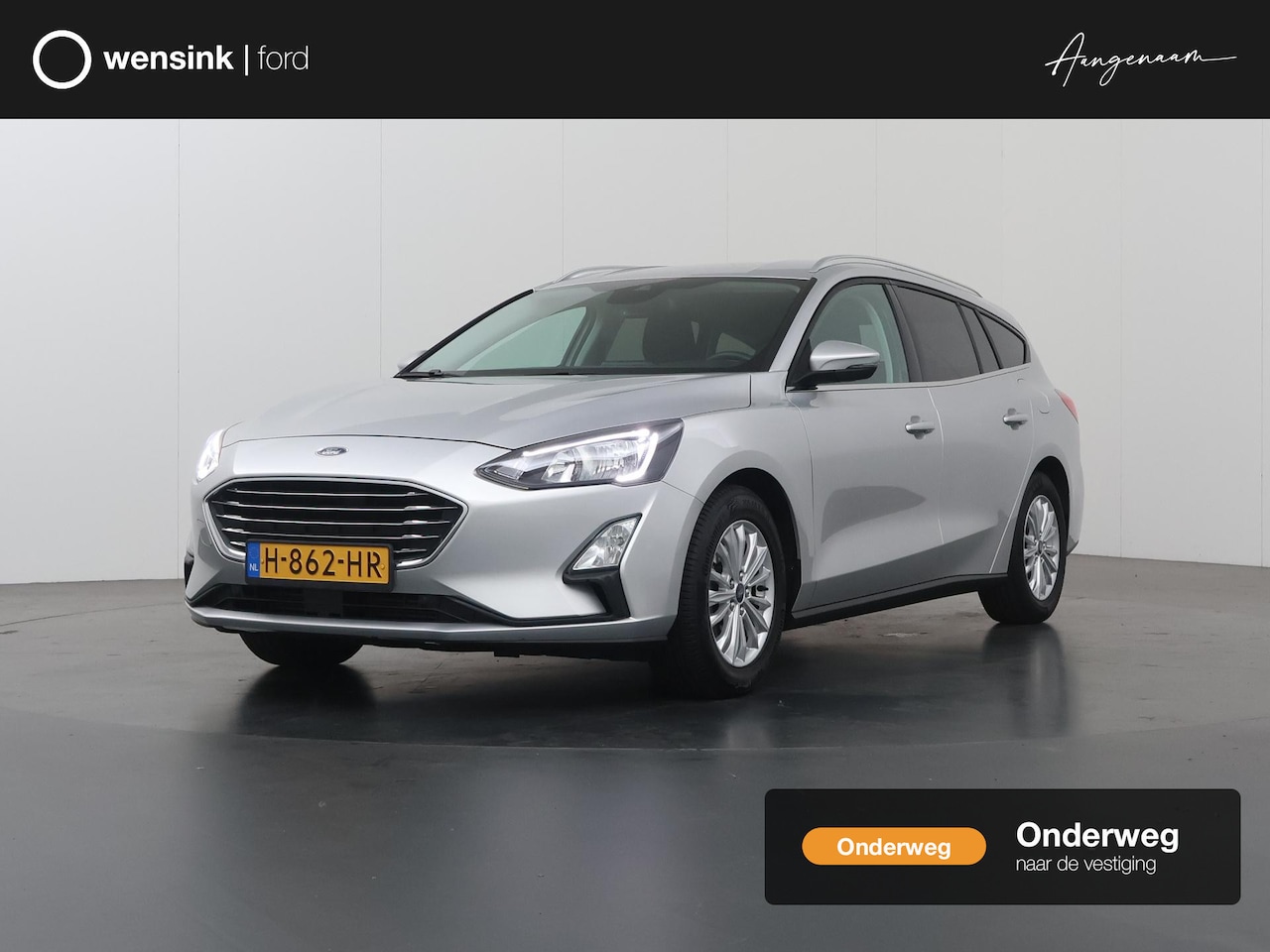 Ford Focus Wagon - 1.0 EcoBoost Titanium Business | Winterpakket | Climate Control | Cruise Control | Parkeer - AutoWereld.nl