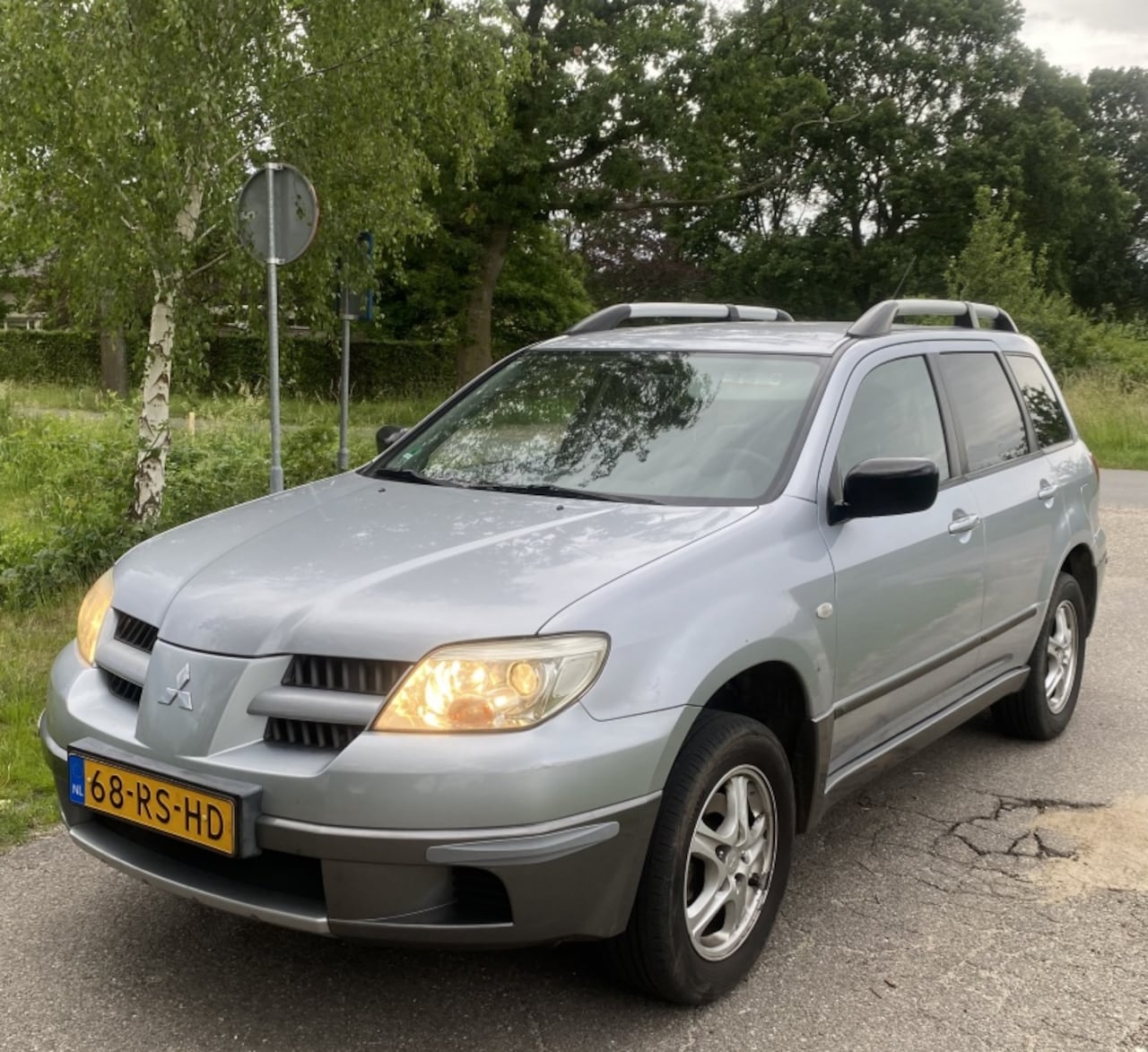 Mitsubishi Outlander - 2.0 Invite plus 2.0 Invite plus - AutoWereld.nl