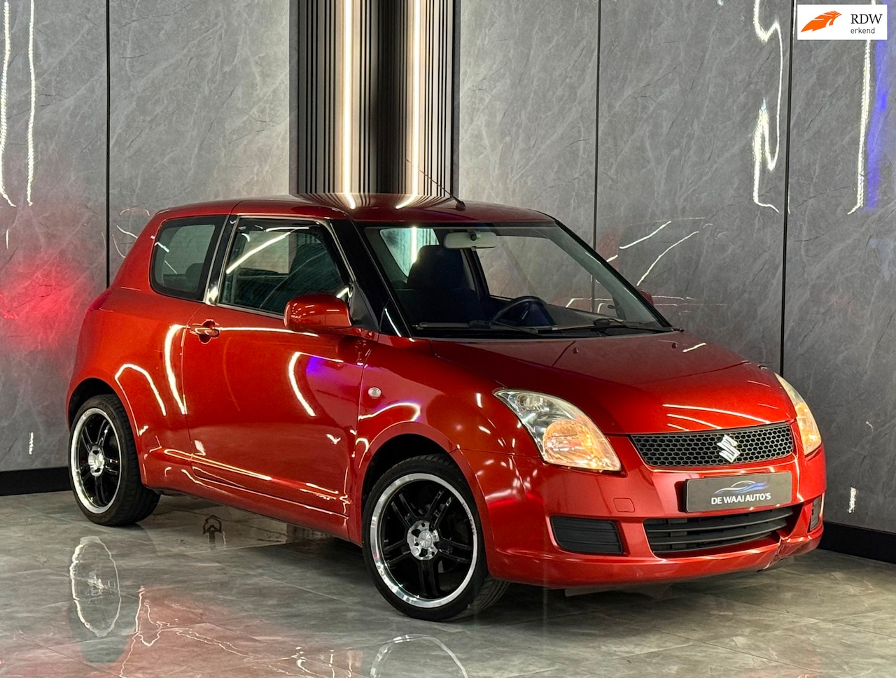 Suzuki Swift - 1.3 Base |Sfeer|Navi|Airco|Stuurbed|Velgen|elek. Ramen|Boekjes - AutoWereld.nl
