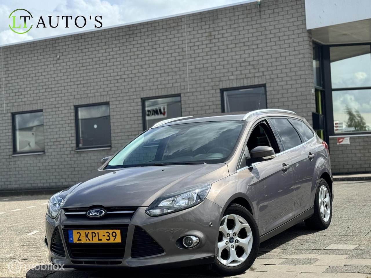Ford Focus Wagon - 1.6 TDCI ECOnetic Lease Titanium|Leer Navi - AutoWereld.nl