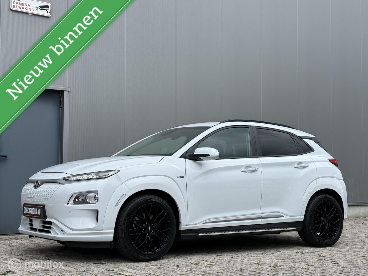 Hyundai Kona Electric - EV Premium 64 kWh - luxe uitvoering - SOH 90% - AutoWereld.nl