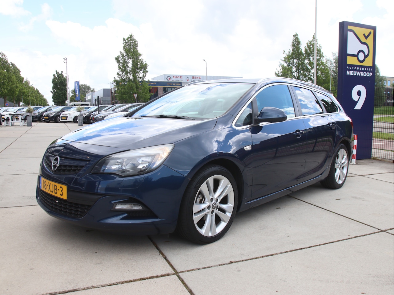 Opel Astra Sports Tourer - 1.4 Turbo Sport Navi, PDC, LMV, Cruise, Climate Zomer actie! - AutoWereld.nl