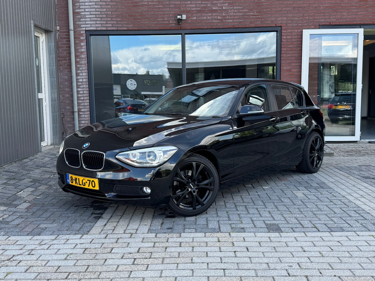 BMW 1-serie - 114i EDE Executive | PDC | Navi | Clima | Cruise | - AutoWereld.nl