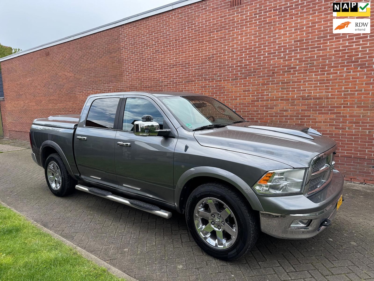 Dodge Ram 1500 - 5.7 V8 4x4 Quad Cab 6'4 Leder Navi Cruise - AutoWereld.nl