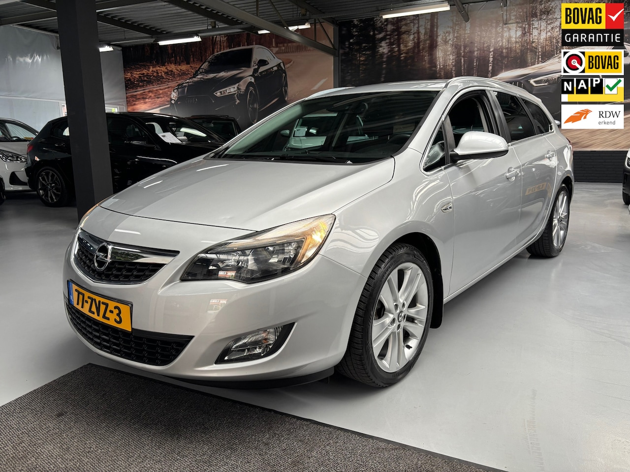 Opel Astra Sports Tourer - 1.4 Turbo Sport / Navi / Airco - AutoWereld.nl