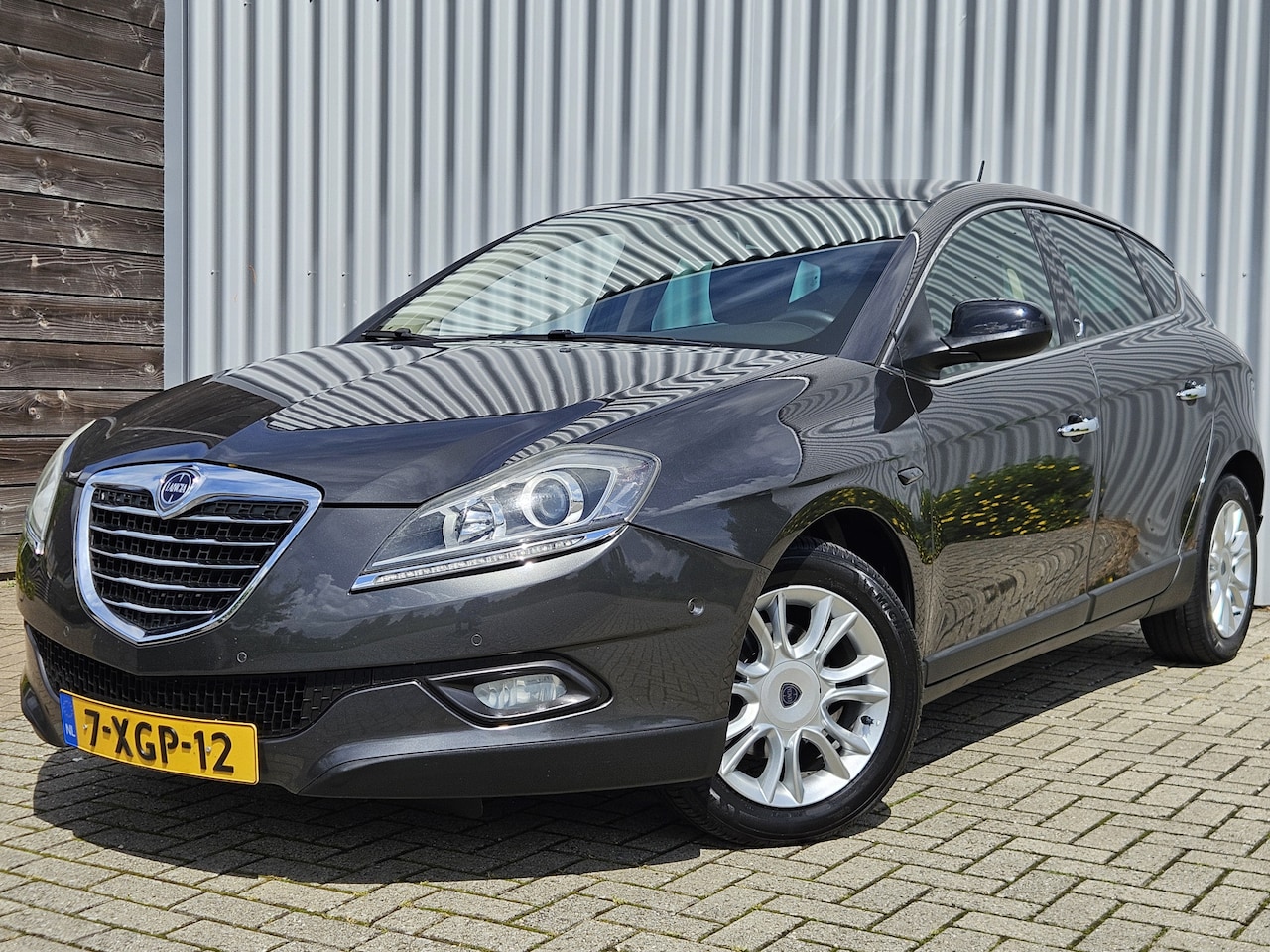 Lancia Delta - 1.4 M.air Silver /Dealer Onderhouden/Cruise/Airco! - AutoWereld.nl
