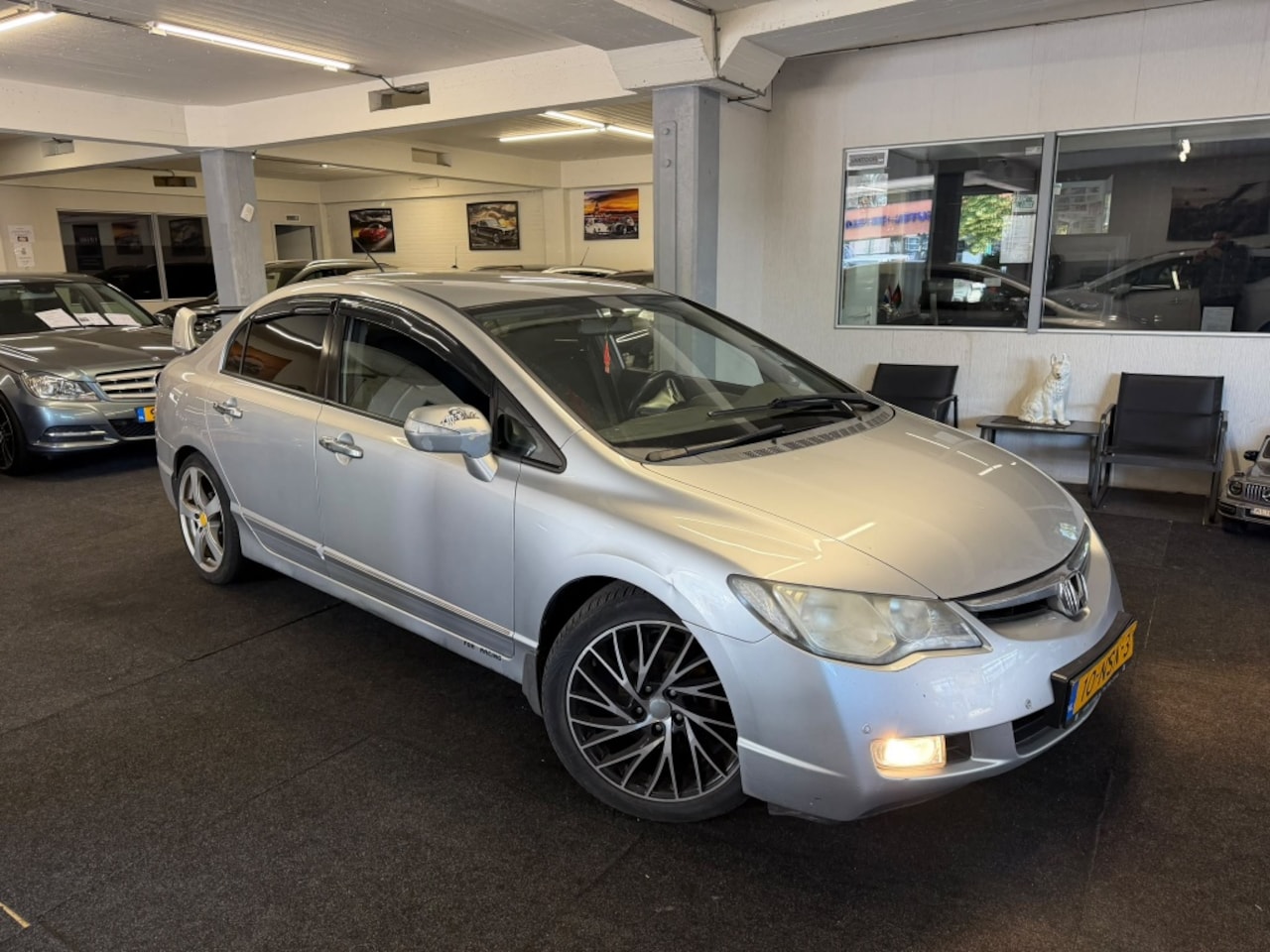 Honda Civic - 1.3 Hybrid Sport * Hybride *APK - AutoWereld.nl